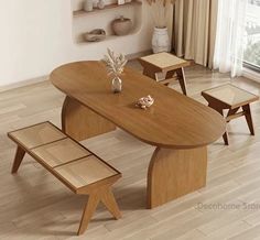 a wooden table and benches in a room