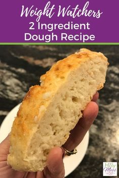 a hand holding a piece of bread with the words weight watchers 2 ingredient dough recipe