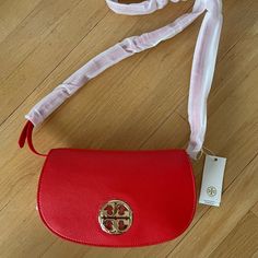 Nwt Tory Burch Authentic Jamie Crossbody In Beautiful Samba. Matching Leather Strap. Classic Gold Logo Which Is Still Covered In The Original Plastic. Interior Zipper And Another Zipper Under The Flap. Strap Is Fully Attached. Bright And Cheery Color Is Sure To Dress Up Any Outfit Tory Burch Crossbody Bag, Tory Burch Purse, Tory Burch Crossbody, Tory Burch Robinson, Brown Crossbody, Tory Burch Bags, Crossbody Messenger Bag, Tory Burch Bag, Leather Crossbody Purse