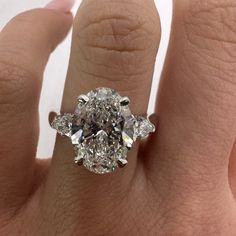 3.07 Carat E Vs2 Oval Lab Grown Diamond Center Stone With Petite Pears And Round Lab Diamond Accenting Totaling To An Additional 0.68 Carats Bringing This Ring To A Total Of 3.75 Ctw. 14k White Gold, Ring Size 7 But Can Be Resized. Lots Of Diamonds Engagement Ring, Giant Engagement Ring, Engagement Ring Three Stone, Ring Three Stone, Wedding Rings Round, Oval Diamond Engagement, 3 Stone Engagement Rings, Oval Diamond Engagement Ring, Beautiful Engagement Rings