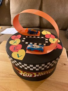 a birthday cake with a race car on it