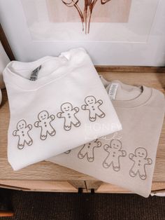 "Embroidered Gingerbread Man Sweatshirt. Embroidery size: approximately 8.5\" in length (across chest) Sizes: UNISEX Small, Medium, Large, XLarge, 2Xlarge -Fit is a little loose Color: Sand Thread: Beige Wash & Care: -Wash in cold water with like colors on a gentle cycle -Tumble dry low or hang to dry PROCESSING/TURNAROUND TIME: -Processing/Turn around times may vary. Please check the estimated ship/delivery times.  -Processing/Turn around time DOES NOT include shipping time. *PLEASE NOTE color Christmas Embroidery Sweatshirts, Embroidery Sweatshirt Ideas, Embroidery Business, Embroidery Shirts, Cricut Htv, Faith Apparel, Faith Clothing