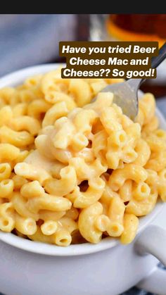 a white bowl filled with macaroni and cheese