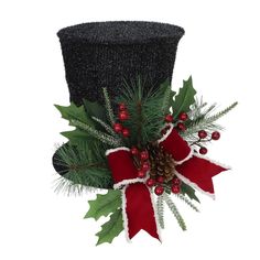 a top hat decorated with holly and red ribbon, pine cones, and evergreen leaves