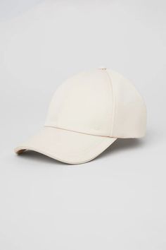 Satin Off-Duty Cap - Creme | Alo Yoga Classic Adjustable Hat With Curved Visor, Classic Dad Hat With Curved Visor, Classic Dad Hat With Curved Bill, Classic Cream Baseball Cap With Curved Visor, Classic Adjustable Hat With Curved Bill, Classic Curved Brim Dad Hat, Classic Adjustable Dad Hat With Curved Brim, Classic Beige Dad Hat With Curved Visor, Classic Baseball Cap