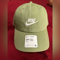 Brand New With Tag Nike Heritage86 Cap In Olive Green. This Is One Size And It’s Adjustable. For Both Men And Women (Unisex) Nike Snapback Hats For Spring, Nike Casual Hat For Spring, Casual Nike Hats For Spring, Nike Cap For Spring, Casual Nike Hat With Curved Visor, Nike Spring Cap, Nike Summer Cap, Nike Casual Hat With Curved Visor, Brown Nike Hat