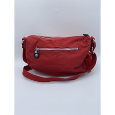 This Kipling Wes Crossbody Bag Purse Is A Vibrant Addition To Any Wardrobe. The Exterior Is Made Of Durable Nylon In A Striking Red Color, With Silver Hardware Accents. The Strap Is Also Red In Color, Adding A Pop Of Personality To The Overall Design. Kipling Bags, Vibrant Red, Silver Hardware, Red Color, Crossbody Bag, Bag Lady, Purse, Exterior, Purses And Bags