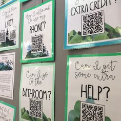 some signs are hanging on the wall with qr - code designs and words that read, can you get some extra help?