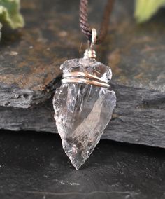 "This Crystal Quartz Arrowhead necklace is handmade with white brass in a technique called wire wrapped. This healing stone is known as the \"master healer\" and will amplify energy and thought, as well as the effect of other crystals. It absorbs, stores, releases and regulates energy. Clear Quartz draws off negative energy of all kinds, neutralising background radiation, including electromagnetic smog or petrochemical emanations. I feel deeply in love with this design because this is the first Handmade Adjustable Quartz Necklace, Unique Wire Wrapped Quartz Jewelry, Bohemian Quartz Jewelry With Hand Wrapped Detail, Hand Wrapped Bohemian Quartz Jewelry, Bohemian Hand Wrapped Quartz Jewelry, Bohemian Arrowhead Jewelry As A Gift, Bohemian Arrowhead Jewelry Gift, Bohemian Arrowhead Jewelry As Gift, Wire Wrapped Arrowhead Necklace For Gift