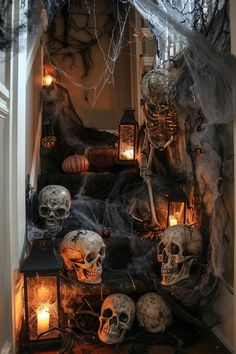 a staircase decorated with halloween decorations and skulls