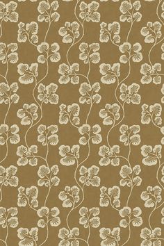 a brown background with white flowers on it