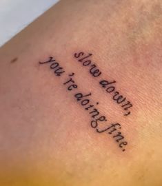 a tattoo with words written on it