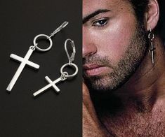 Sterling Silver George Michael Cross Earring R.I.P George Michael This Earring is pure sterling silver Best memorial gift for someone who loves George Michael PLEASE NOTE : THE PRICE IS FOR ONE PIECE Item Dimensions: Small Earring: Cross : 18x12 mm Large Earring: Cross : 29x17 mm Thank you for looking. Please feel free to contact me any time for any reason and concern . Aesthetic Cross, Mens Earrings, Cross Earring, Unisex Earrings, Hammered Hoop Earrings, George Michael, Men Earrings, Cross Earrings, Sterling Silver Hoop Earrings