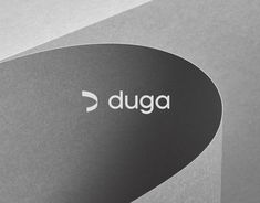 the logo for duga is shown on top of a gray box with white lettering