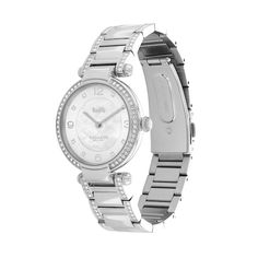 From the Coach Cary collection, this ladies' watch features a mother-of-pearl dial with silver-toned hands and crystal accent markers, mineral crystal with a crystal embellished bezel in a 34.0mm stainless steel case. The reliable quartz movement ensures accurate time keeping. The crystal accented stainless steel link bracelet secures with a push-button deployment clasp. Water resistant to 30 meters, this watch comes with a two-year limited manufacturer warranty. We are an authorized Coach dealer. Horse And Carriage, Steel Design, Women's Watch, Minerals Crystals, Sophisticated Style, Quartz Movement, Stainless Steel Case, Mother Of Pearl, Womens Watches