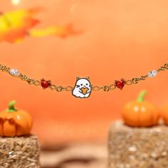 Unleash your inner "scaredy cat" with our Boo Kitty Bracelet! Handcrafted with high-quality materials, this bewitching bracelet feature a unique and eye-catching design, adding a touch of playful sophistication to any outfit. Embrace the magic of the spooky season with our ghostly kitty bracelet. Novelty Halloween Jewelry For Friendship, Halloween Bracelet Jewelry Gift, Halloween Novelty Jewelry Bracelet, Halloween Novelty Bracelet, Spooky Halloween Bracelets For Gift, Halloween Charm Bracelet Gift, Spooky Halloween Gift Bracelets, Halloween Gift Charm Bracelet, Handmade Charm Bracelet For Halloween Gift