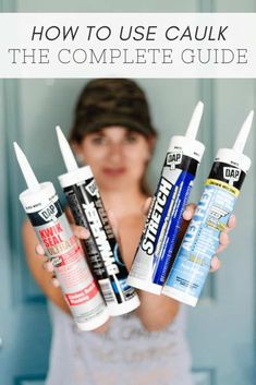 a woman holding four different types of caulk in her hands with the text how to use caulk