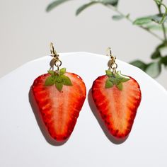 Hello:) Welcome to my shop! - Handmade item - size: 35*30mm - Materials: Gold/Silver Plated Earrings Hooks, Resin, Real Fruit Slice - Real strawberry slice, Resin encased design - Birthday personality gift 🎁 Gift Box Wrapping: Unique rings are suitable for women. Wife, Girlfriend, Mother, Grandmother, Daughter, Women Friends and yourself. 🍃 Free shipping: The package needs about 3-10 days to get all over the world. Please feel free to contact me with any questions :)