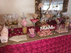 a table topped with lots of candy and candies