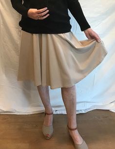 Beige skirt with angled seam going down from the high hip to the hem. The lower half has a lovely draped flare, making this a great skirt for day wear or dancing. The skirt has a side zipper and measures 44cm (17") across the waist and is 64cm (25") long. It is made from a fine twill-weave polyester fabric. One only - made from my fabric stock. Check out my other listings and combine the postage. Beige A-line Pleated Skirt For Fall, Classic Beige A-line Skirt, Cream Fitted Asymmetrical Skirt, Fitted Cream Asymmetrical Skirt, Cream Asymmetrical Relaxed Skirt, Fitted Beige Asymmetrical Skirt, Fitted Asymmetrical Beige Skirt, Beige Fitted Asymmetrical Skirt, Cream Asymmetrical Flowy Skirt