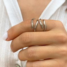 We are introducing our new Chunky Silver Ring! This is an Irregular ring with textured  Wavy Lines. With its unique and eye-catching style, this Quirky ring is a must-have accessory that effortlessly elevates your everyday look. An Asymmetric Ring, handmade with ✔️ 925 Sterling Silver &  24k yellow gold  finish all over the silver✔️ So, If you prefer statement rings, this  Large Abstract Ring is an excellent choice. Thanks to the open part you can wear it to all your fingers, even as a chevalier Trendy Irregular Silver Ring, Squiggle Ring, Adjustable Silver Wavy Rings, Minimal Chunky Rings, Asymmetric Ring, Modern Irregular Metal Ring Jewelry, Abstract Ring, Quirky Ring, Chunky Silver Rings