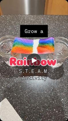 a glass bowl with a rainbow bow on it and the words grow a rainbow above it