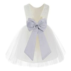 The elegant bodice feature is made of floral lace with soft tulle at the bottom. The waistline is decorated with a removable tiebow sash and to make this dress more elegant. The skirt has 3 layers, top 1st and 2nd layers is made of elegant tulle. 3rd is a layer of soft satin lining to bring comfort to your little girl while wearing the dress. The back of the dress has a button closure. Size: 5.  Color: Silver.  Gender: female.  Age Group: kids. Flower Girl Dresses Knee Length, Recital Dress, Dresses Fancy, Ivory Lace Dress, Holiday Theme, Father Daughter Dance, Dance Recital, Pageant Gowns, Soft Tulle