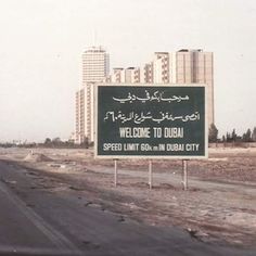 a large sign on the side of a road