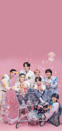 the members of btop are posing for a photo with bubbles in front of them