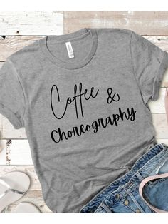 COFFEE and CHOREOGRAPHY Tee Shirt, Dance Teacher Gift, Dance Teacher Appreciation, Dancer Gift, Choreographer,Unisex Jersey Short Sleeve Tee This classic unisex jersey short sleeve tee fits like a well-loved favorite. Soft cotton and quality print make users fall in love with it over and over again. These t-shirts have-ribbed knit collars to bolster shaping. The shoulders have taping for better fit over time. Dual side seams hold the garment's shape for longer. \n.: 100% Airlume combed and rings Dance Teacher Shirts Ideas, Dance Teacher Shirt, Gift For Dance Teacher, Dance Shirts Ideas, Dance Teacher Gifts, Dancer Gift, Dance Teachers, Dance Gifts, Mommy Shirts