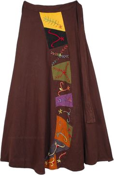 An utterly bohemian skirt in a distinctive brown color that stands out beautifully; the hand crafted palette of warm colored blocks each depicting different abstract grasses sewed into the fabric, it bespeaks both fall and harvest.  Made from pure heavyweight knit jersey cotton which adds to stretch and movement with the skirt. #tlb #WrapAroundSkirt #Stonewash #XLPlus #Fall #bohemianfashion #Handmade #XXLskirtforfall #XXLlongwrapskirt #brownlongwrapskirt Bohemian Brown Skirt For Fall, Fall Bohemian Brown Skirt, Brown Cotton Long Skirt, Long Brown Cotton Skirt, Brown Long Cotton Skirt, Brown Patchwork Skirt For Fall, Fall Patchwork Brown Skirt, Bohemian Brown Cotton Skirt, Brown Long Skirt For Festival