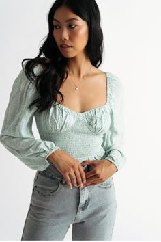 Lazy Afternoon Mint Ditsy Floral Smocked Crop Top https://www.tobi.com/product/77116-tobi-lazy-afternoon-ditsy-floral-smocked-crop-top?color_id=109574&utm_source=pinterest&utm_medium=social&utm_campaign={campaignid}_{adgroupid}_{product_id} Spring Smocked Top With Elastic Square Neckline, Spring Floral Smocked Top, Fitted Smocked Top With Ditsy Floral Print For Spring, Fitted Smocked Top In Flirty Style For Spring, Fitted Smocked Top For Spring, Flirty Style, Spring Fitted Flirty Smocked Top, Fitted Smocked Top With Elastic Neckline For Spring, Fitted Flirty Smocked Top For Spring, Trendy Spring Tops With Sweetheart Neckline