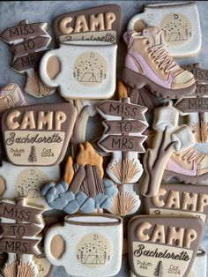 cookies decorated with camping related items on a table