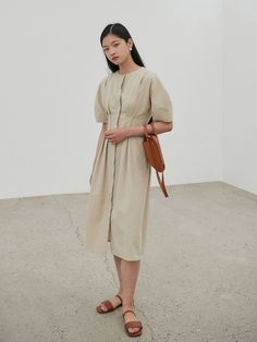 Editor's Notes The dress is made with a mix of linen and has a feminine silhouette. - Tuck that accentuates the waist- Voluminous sleeves- Neat and feminine mood- Hidden closing at the frontMeasurements(in.)34 / 36- Side Neck - Sleeve Hem: 15.94 in. / 16.34 in.- Chest: 16.14 in. / 17.13 in.- Waist: 13.19 in. / 14.17 in.- Sleeve Width: 8.27 in. / 8.46 in.- Total Length: 44.88 in. / 45.47 in.*There may be ±5% of error depending on each product*There may be errors from different Beige Linen Dress For Workwear, Beige Linen Dress For Work, Beige Linen Midi Dress For Work, Elegant Neutral Linen Dress For Daywear, Elegant Neutral Linen Daywear Dress, Chic Neutral Linen Dress For Daywear, Cream Linen Midi Dress For Daywear, Beige Knee-length Linen Dress For Work, Chic Beige Linen Workwear Dress