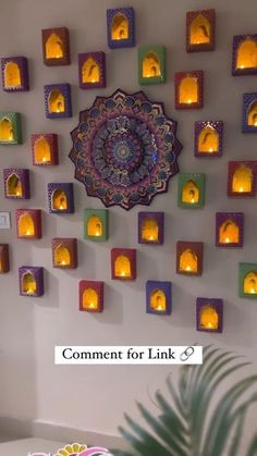 the wall is decorated with candles and an intricate design on it's side,