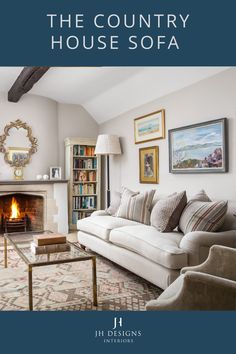 a living room filled with furniture and a fire place in the middle of it's walls