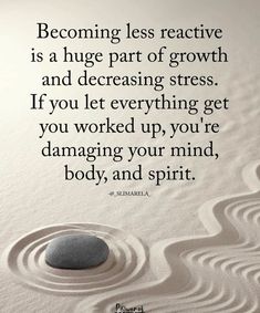 a rock sitting on top of a sandy beach next to a quote about being happy