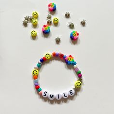 "Candy-Coated SMILE 😊 Each one of these enchanting bracelets is crafted and hand-made by me with love️. Bracelets will be very similar to those in the pictures and the color theme will be the same. This bracelet features the phrase \"SMILE\" which makes it the perfect accessory for those who want to remind themselves, or others, to embrace happiness every day✨.   For teenagers and women, we recommend our standard size of 6.5 inches, while kids may need a smaller size. Treat yourself to the Cand Themed Handmade Wristband For Gift, Handmade Themed Wristband For Gift, Handmade Themed Wristband Gift, Customizable Novelty Friendship Bracelets As Gifts, Themed Multicolor Wristband As A Gift, Themed Multicolor Wristband For Gift, Themed Multicolor Wristband As Gift, Customized Themed Bracelets For Birthday, Fun Customized Jewelry For Friendship