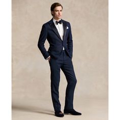 These tuxedo trousers are expertly tailored in Italy with luxuriously lightweight linen. Along the outer side of the legs they feature satin stripes made with a mulberry silk blend. Elegant Slim Fit Wedding Bottoms, Elegant Slim Fit Bottoms For Wedding, Elegant Ralph Lauren Suit With Notch Lapel, Tailored Classic Wedding Pants, Classic Tailored Pants For Wedding, Tailored Classic Pants For Wedding, Ralph Lauren Semi-formal Elegant Suits, Elegant Tailored Dress Pants For Wedding, Ralph Lauren Elegant Semi-formal Suits