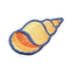 an embroidered patch with the shape of a shell