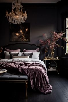 a bedroom with black walls, purple bedding and a chandelier hanging from the ceiling