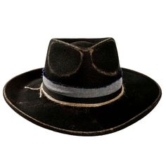 Add a touch of rugged elegance to your style with the Small Town Felt Fedora Hat. Crafted from high-quality distressed outback wool felt, this fedora exudes sophistication and luxury. Perfect for any occasion, this hat is sure to elevate your look. Rustic Winter Fedora With Curved Brim, Rustic Fedora With Short Brim For Fall, Rustic Brimmed Fedora For Winter, Rustic Short Brim Fedora For Fall, Rustic Flat Brim Fedora For Winter, Rustic Fedora For Winter Country Events, Rustic Winter Fedora With Flat Brim, Western Wool Top Hat, Rustic Short Brim Felt Hat For Winter