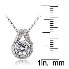 Wear the look of luxury and enjoy the vintage of elegance with this breathtaking 100 facets cubic zirconia necklace. The 100 facets transform the ordinary cubic zirconia stone into a brilliant jewel. The necklace showcases a white cubic zirconia stone accented by a cubic zirconia studded teardrop and is crafted of platinum plated sterling silver. Product Details Metal Type sterling-silver Metal Stamp 925-sterling Weight 3.4GR Length 18IN Width 11.62MM Clasp Type spring-ring Chain Type rolo Chain Formal Drop Necklace With Brilliant Cut Cubic Zirconia, Elegant Cubic Zirconia Drop Necklace With Diamond Cut, Classic Cubic Zirconia Drop Necklace With Brilliant Cut, Cubic Zirconia Teardrop Diamond Necklace With Prong Setting, Classic Drop Necklace With Brilliant Cut Cubic Zirconia, Classic Brilliant Cut Cubic Zirconia Drop Necklace, Elegant Cubic Zirconia Solitaire Teardrop Necklace, Classic Pear-shaped Cubic Zirconia Solitaire Necklace, Elegant Cubic Zirconia Teardrop Solitaire Necklace