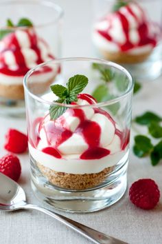 a dessert in a glass bowl on top of a table