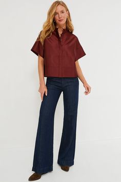 The Merlot Dupioni Trapunto Stitch Sofia Shirt is the elevated style staple your closet needs. A short sleeve button down with a slightly cropped hem and a boxy silhouette that's perfect for pairing with all kinds of bottoms, this style is finished with trapunto stitching that adds an extra-special detail to a classic look. Style with trousers and flats for the office, with a skirt and kitten heels for a dinner date, or with denim and crisp sneakers for weekend wear — this number can do it all. Unstructured Button-up Tops With Pockets, Fitted Poplin Button-up Shirt, Collared Burgundy Top With Button Closure, Collared Poplin Top With Button Closure, Burgundy Button-up Shirt With Button Closure, Whale Tail, Cocktail Attire, Weekend Wear, Office Fashion