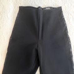 Nwot Black Skinny Pant With Mesh Panels. Legging Like Fit But A Thicker Fabric. Dress Up Or Dress Down For Casual Look. Size Xs Back Zipper No Waist Band Never Worn. Nwot Fabric Stretches. Ankle Length. Party Bottoms With Back Zipper And Stretch, Chic Party Bottoms With Back Zipper, Stretch Bottoms With Back Zipper For Night Out, Chic Black Bottoms With Back Zipper, Black Party Bottoms With Back Zipper, High Waist Bottoms With Back Zipper For Night Out, High-waist Bottoms With Back Zipper For Night Out, Fitted Black Bottoms For Date Night, Fitted High Waist Bottoms With Back Zipper