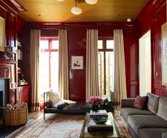 a living room filled with furniture and a fire place