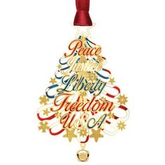 a christmas tree ornament with the words peace and liberty written in different colors