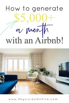 a blue couch sitting in front of a tv on top of a wooden floor