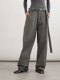 ALAÏA Belted jersey-paneled cotton-blend twill pants | NET-A-PORTER Chic Cotton Bottoms With Belt Detail, Cotton Bottoms With Belt Detail For Spring, Spring Cotton Bottoms With Belt Detail, Cotton Wide Leg Bottoms With Belt Detail, Wide Leg Cotton Bottoms With Belt Detail, Cotton Wide Leg Pants With Belt, Relaxed Fit Full Length Parachute Pants For Work, Belted Straight Leg Cotton Bottoms, Utility Style Workwear Bottoms With Belted Cuffs